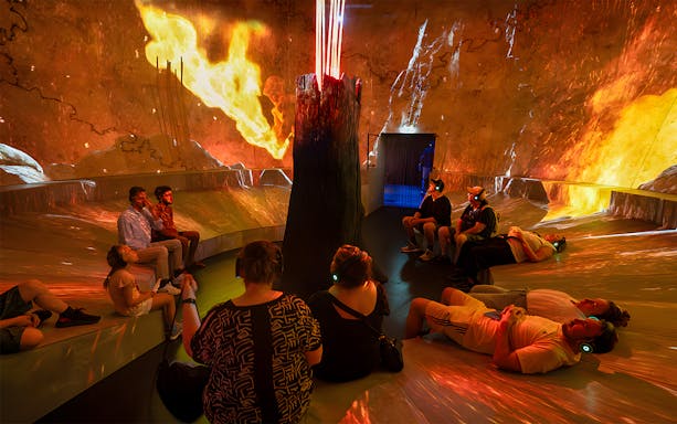 Visitors experiencing immersive Viking exhibition at National Museum of Denmark.