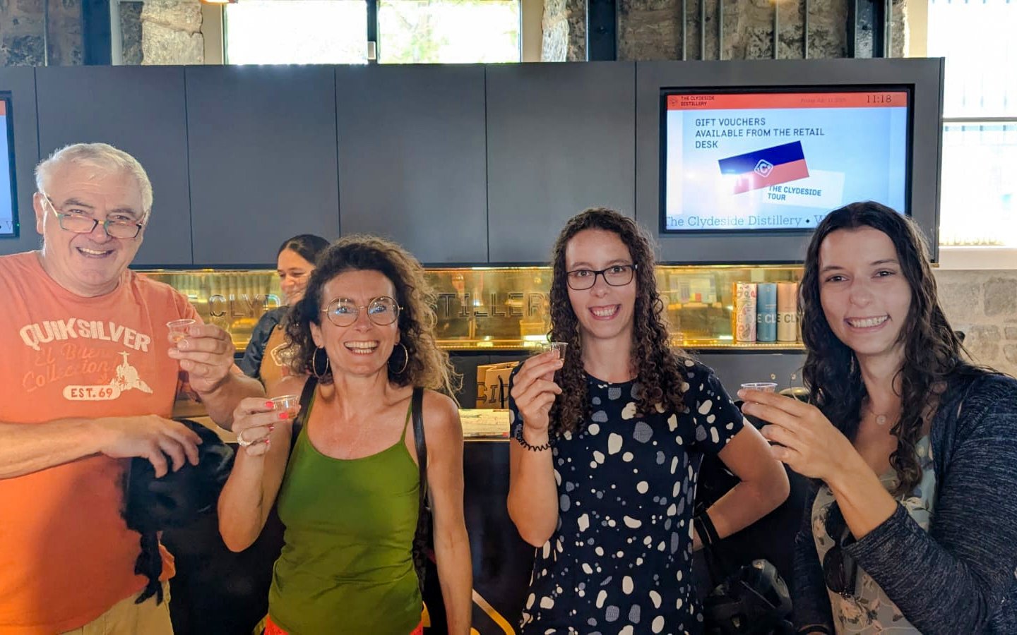 Group enjoying whisky tasting at Clydeside Distillery in Glasgow.