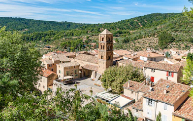Gorges du Verdon village view with historic church tower and surrounding landscape.