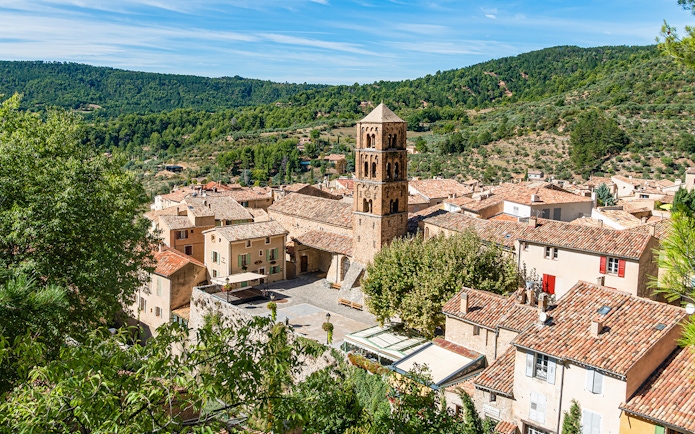 Gorges du Verdon village view with historic church tower and surrounding landscape.