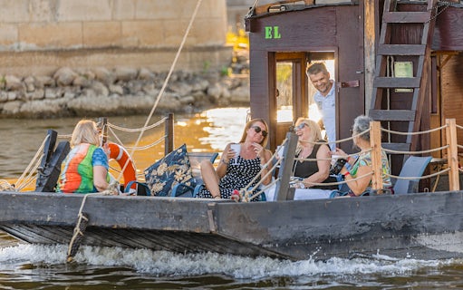 Tourists relaxing on a traditional Galar cruise on the Vistula River.