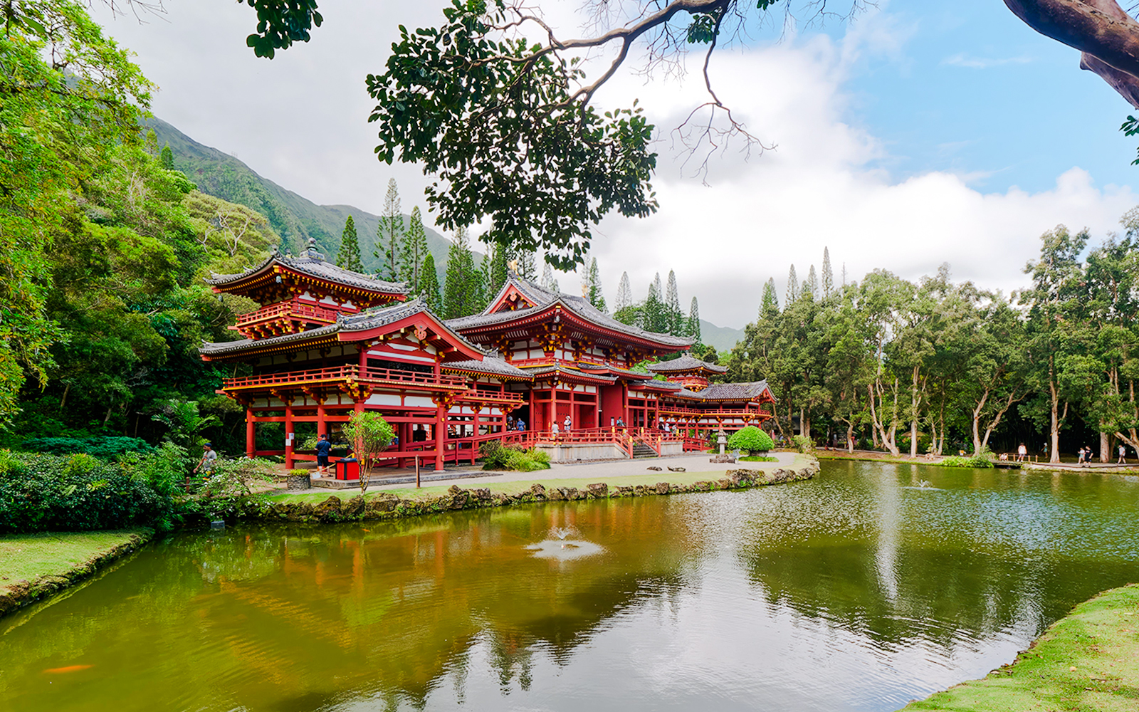 Byodo-In Temple with pond and lush greenery, Valley of the Temples, Oahu, Hawaii.