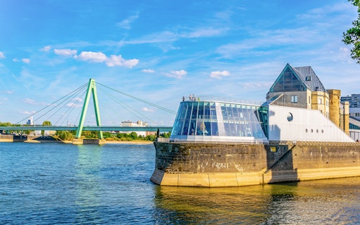 Cologne Harbour with modern building and bridge over the Rhine River.