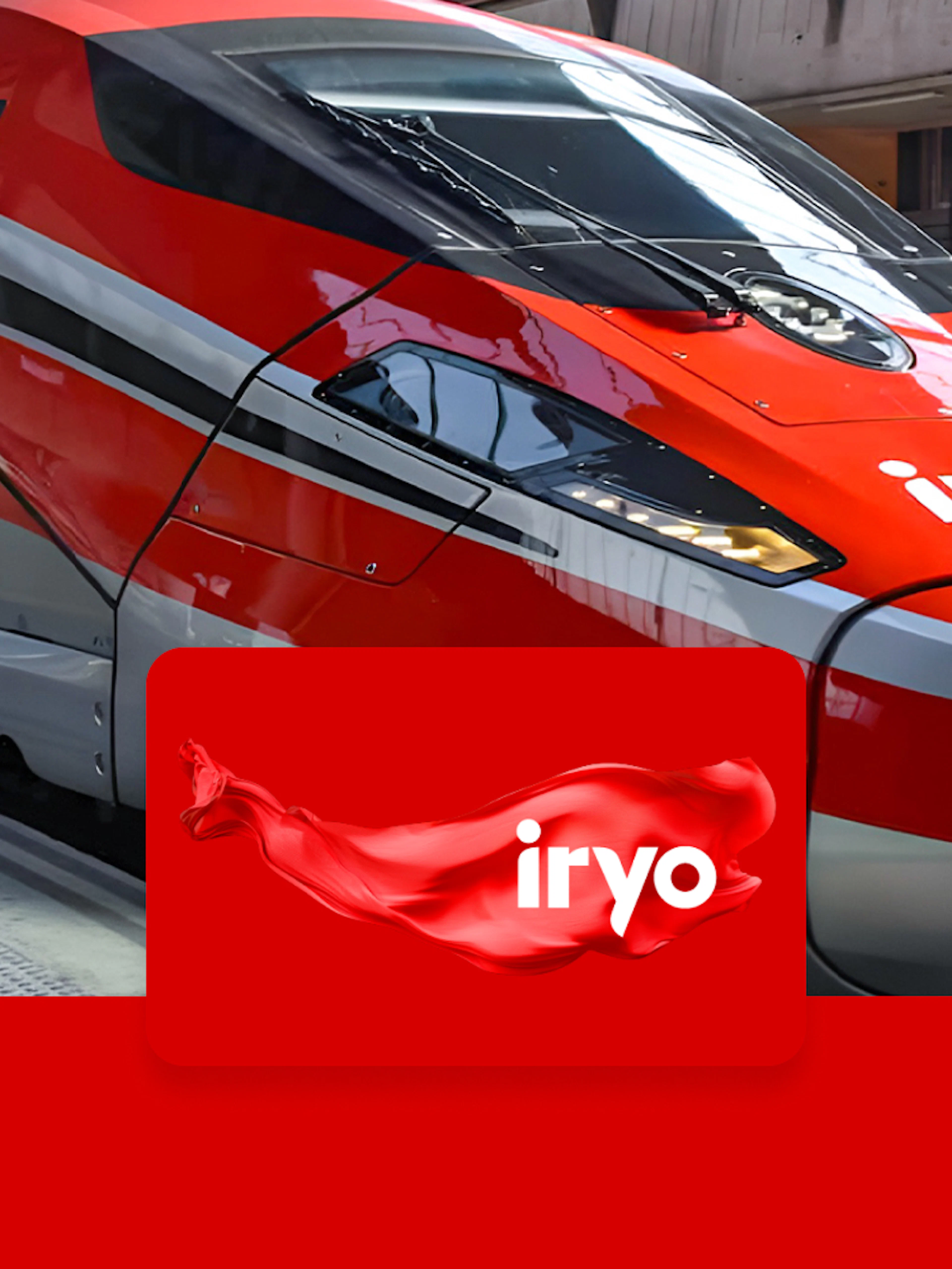 High-speed Iryo train at station for Barcelona Sants to Madrid Atocha route.
