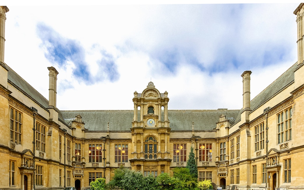 Examination Schools courtyard with clock tower, Oxford, England.