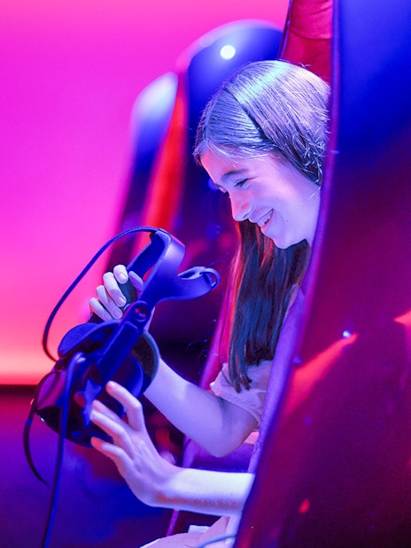 Person enjoying virtual reality experience at Melbourne Skydeck.