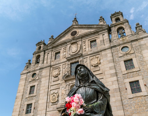 Church and Convent of Santa Teresa with St. Teresa sculpture, Avila, Spain.