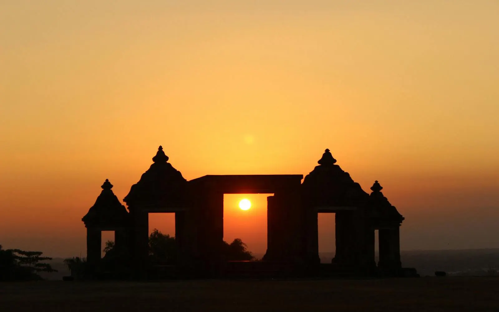Prambanan Temple silhouette at sunset, Yogyakarta, Indonesia.