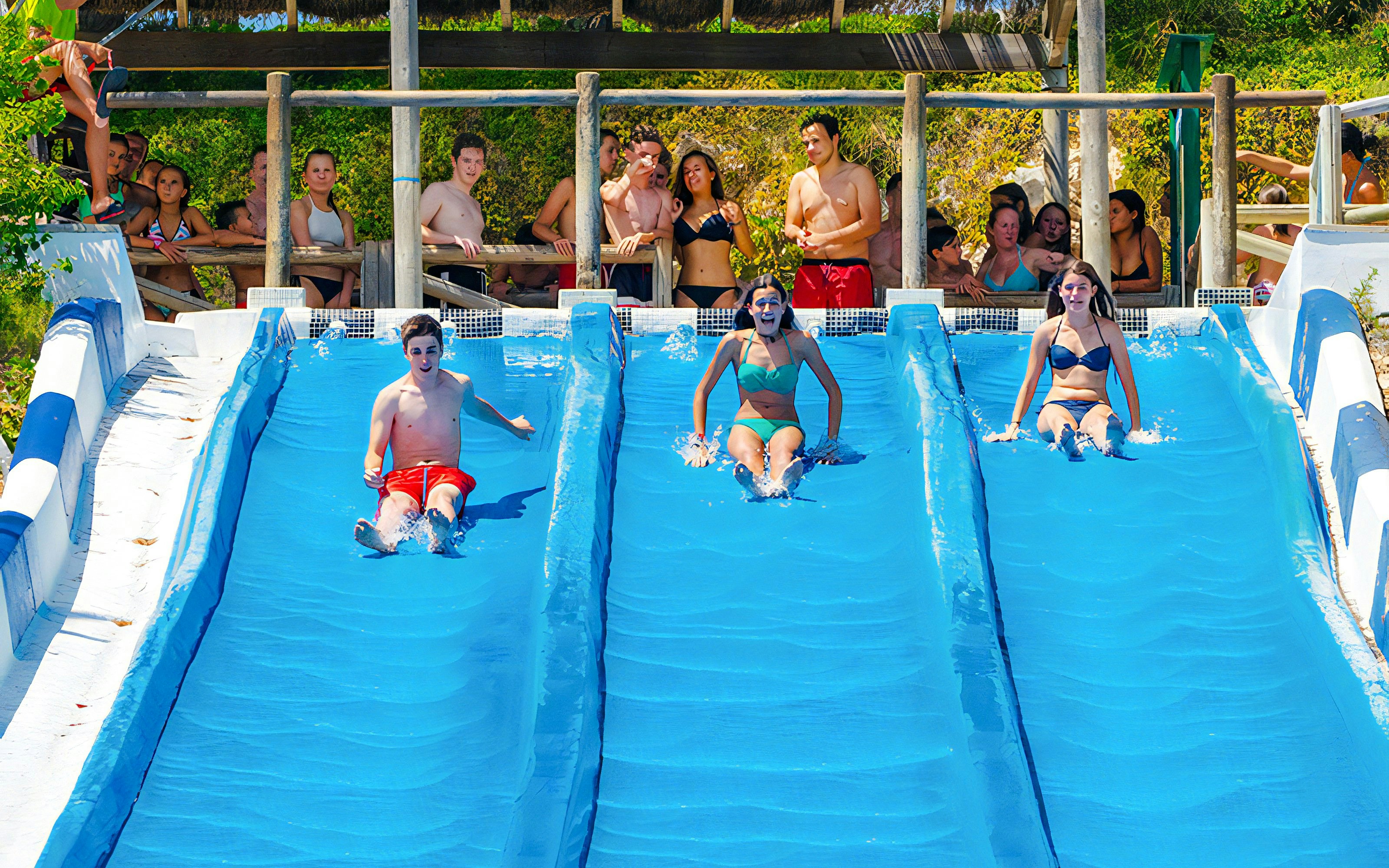 Guests enjoying water slides at Aquopolis Cullera.