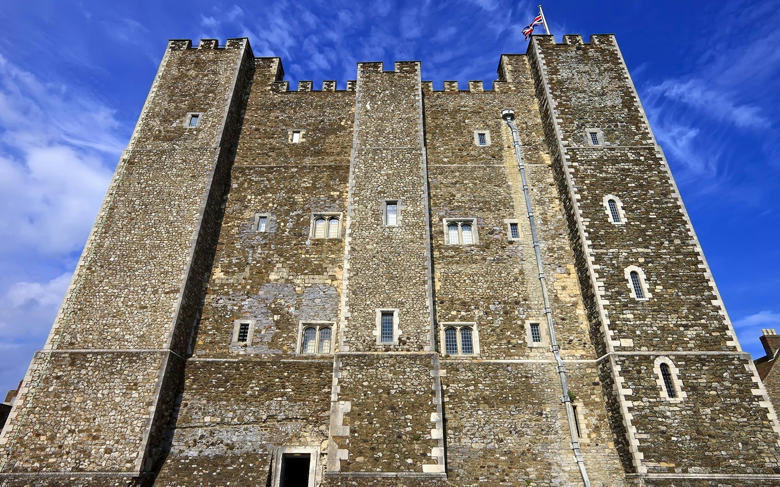 The Great Tower at Dover Castle, England, against a blue sky.