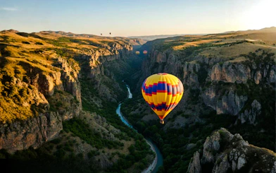 Hot air balloon over Ihlara Canyon at sunrise, Cappadocia.