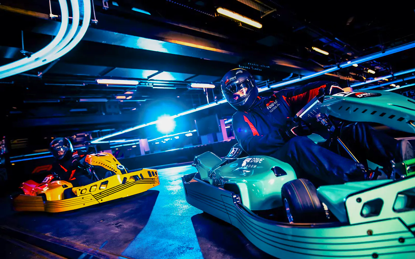 Guests driving go-karts at Elite F1 Drive experience in London.