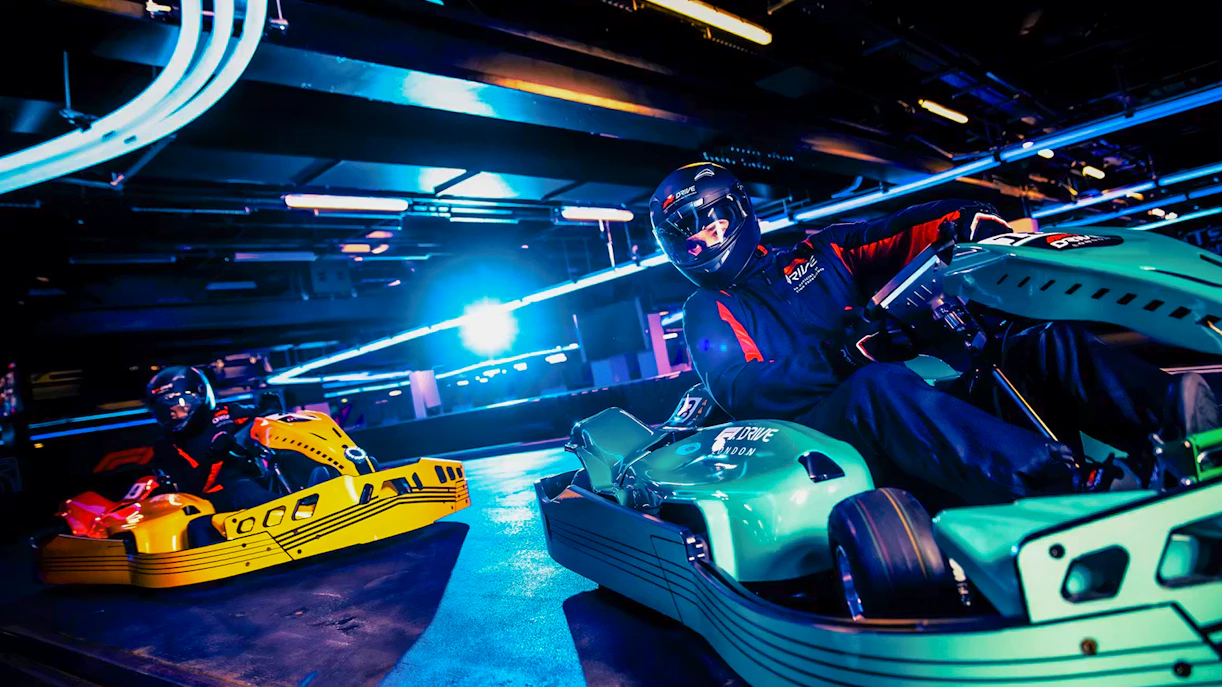 Guests driving go-karts at Elite F1 Drive experience in London.