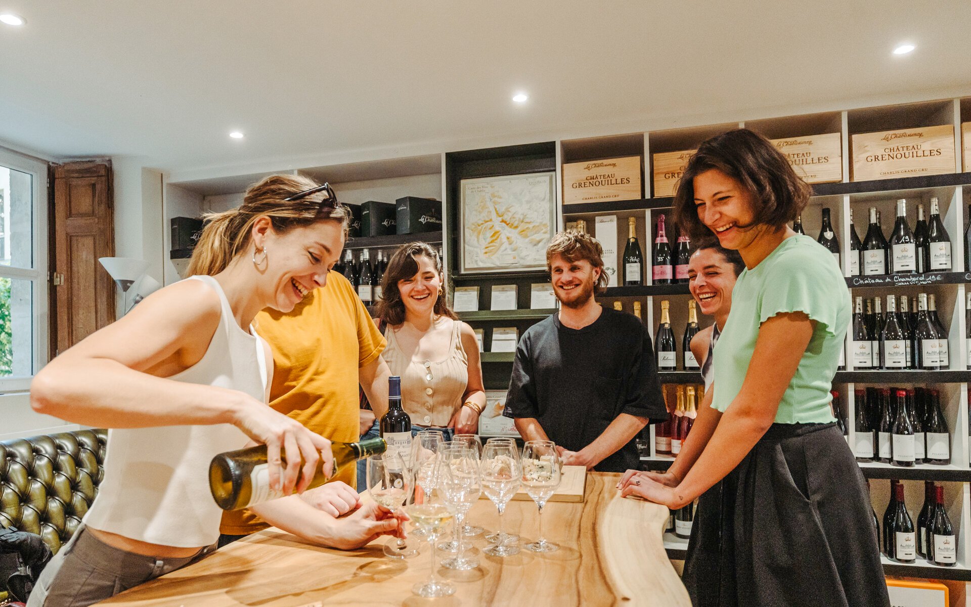 Group enjoying wine tasting on the Ultimate Paris Food Tour.
