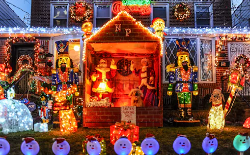 Christmas lights display with Santa, nutcracker, and festive decorations in New York.