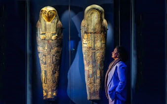 Ancient Egyptian sarcophagi on display at Ramses and the Pharaohs' Gold exhibition.