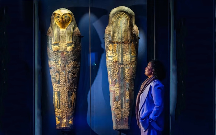 Ancient Egyptian sarcophagi on display at Ramses and the Pharaohs' Gold exhibition.
