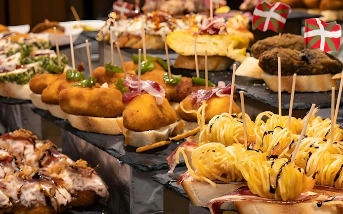 Pintxos selection on display during the Gaztelugatxe, Bilbao, and Guggenheim Museum tour from San Sebastian.