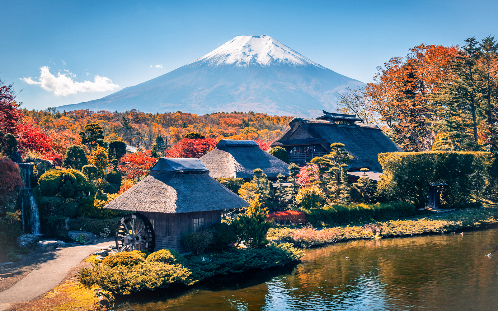 Traditional Japanese village with Mount Fuji in the background near Lake Ashi.
