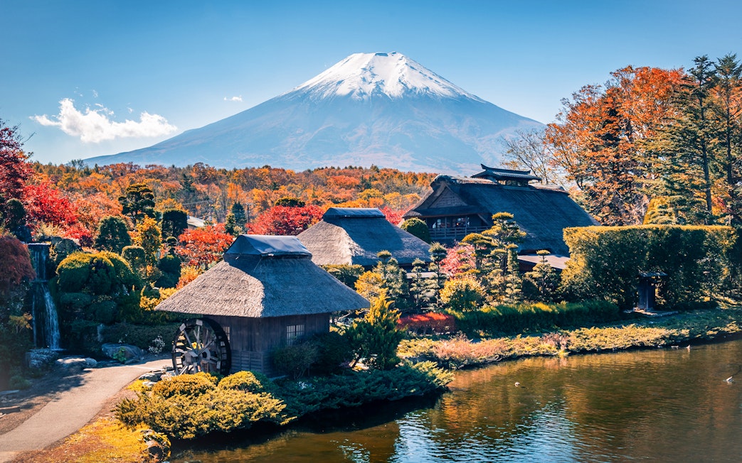 Traditional Japanese village with Mount Fuji in the background near Lake Ashi.