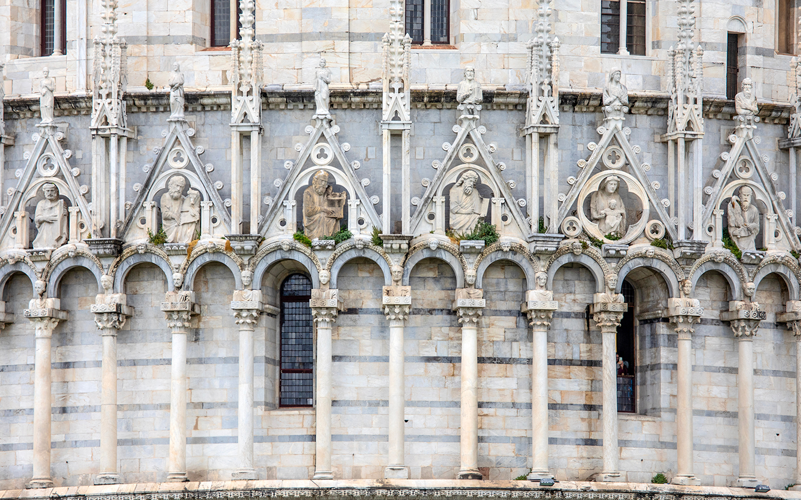 Sculptures on Pisa Baptistery of St. John in Pisa, Italy