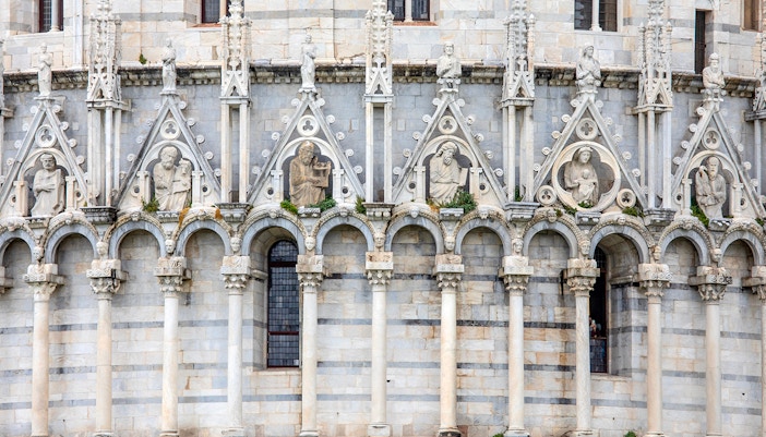 Sculptures on Pisa Baptistery of St. John in Pisa, Italy