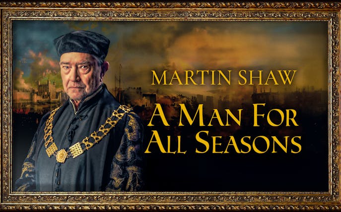 Period-dressed man with a chain necklace, text "A Man For All Seasons" in ornate frame.
