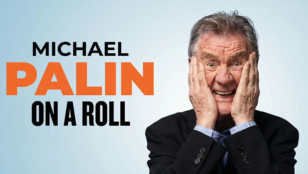 Michael Palin smiling with hands on face, text "On a Roll" beside him.