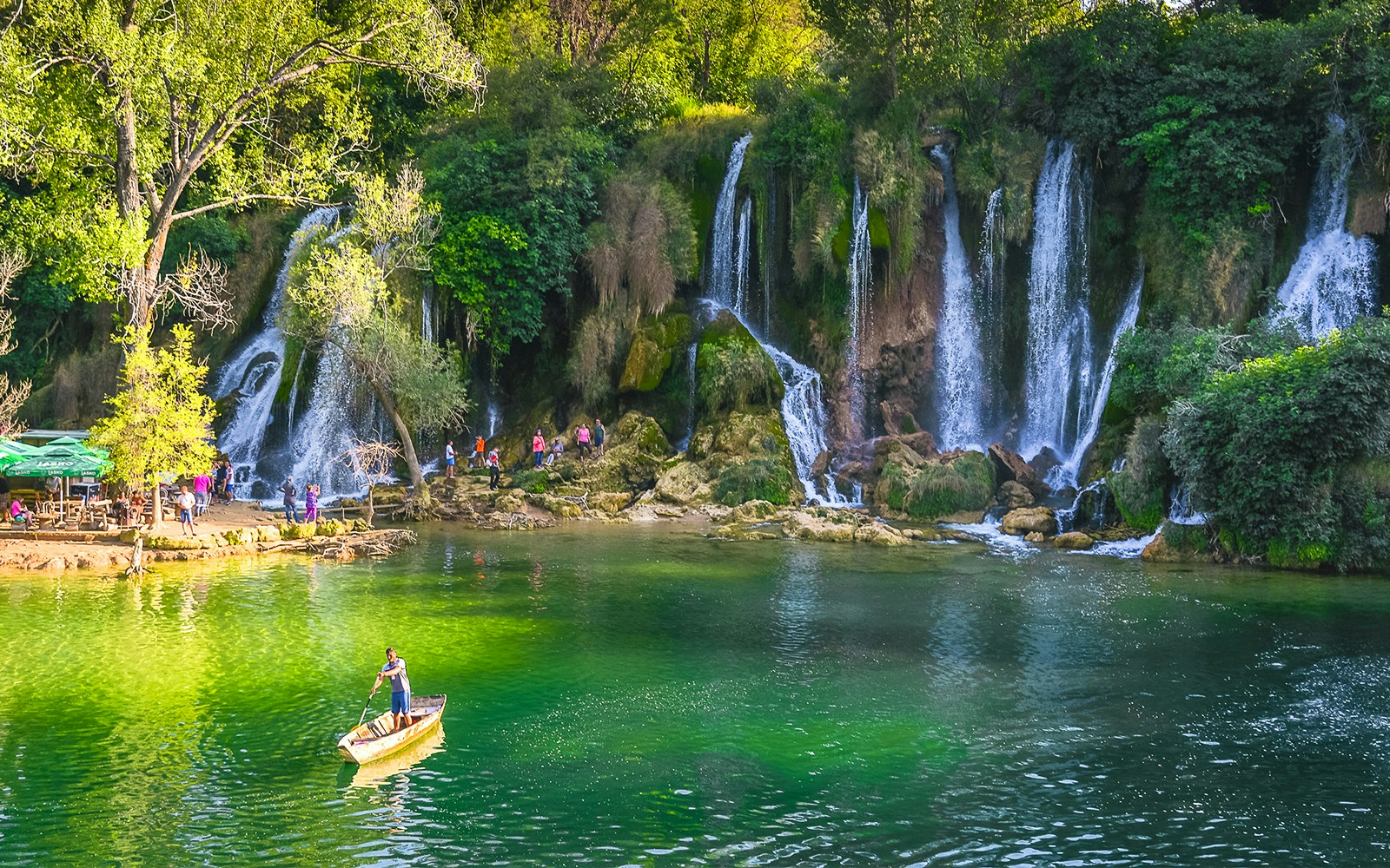 Canoeing near Waterfall Kravica in Bosnia and Herzegovina.