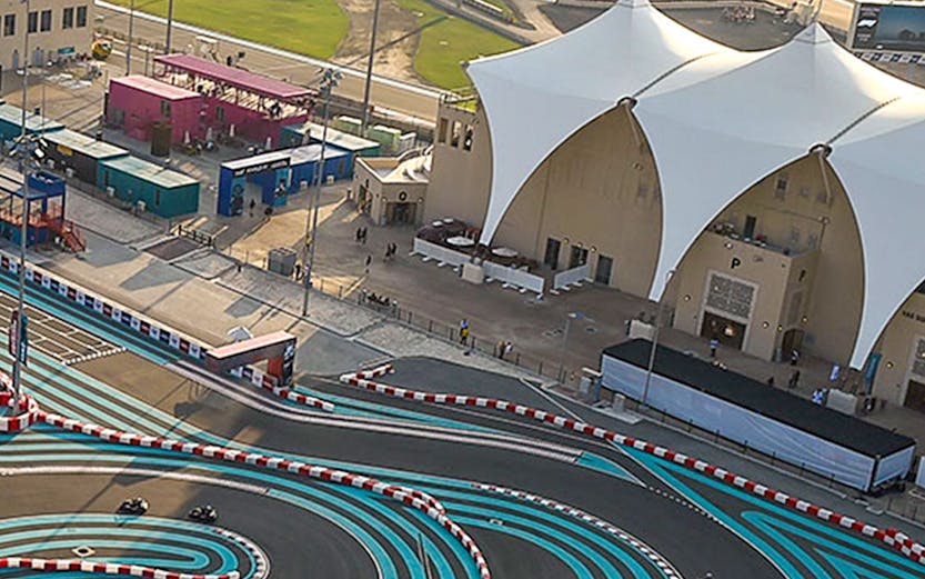 Aerial view of Yas Marina Circuit with winding track and surrounding facilities in Abu Dhabi.