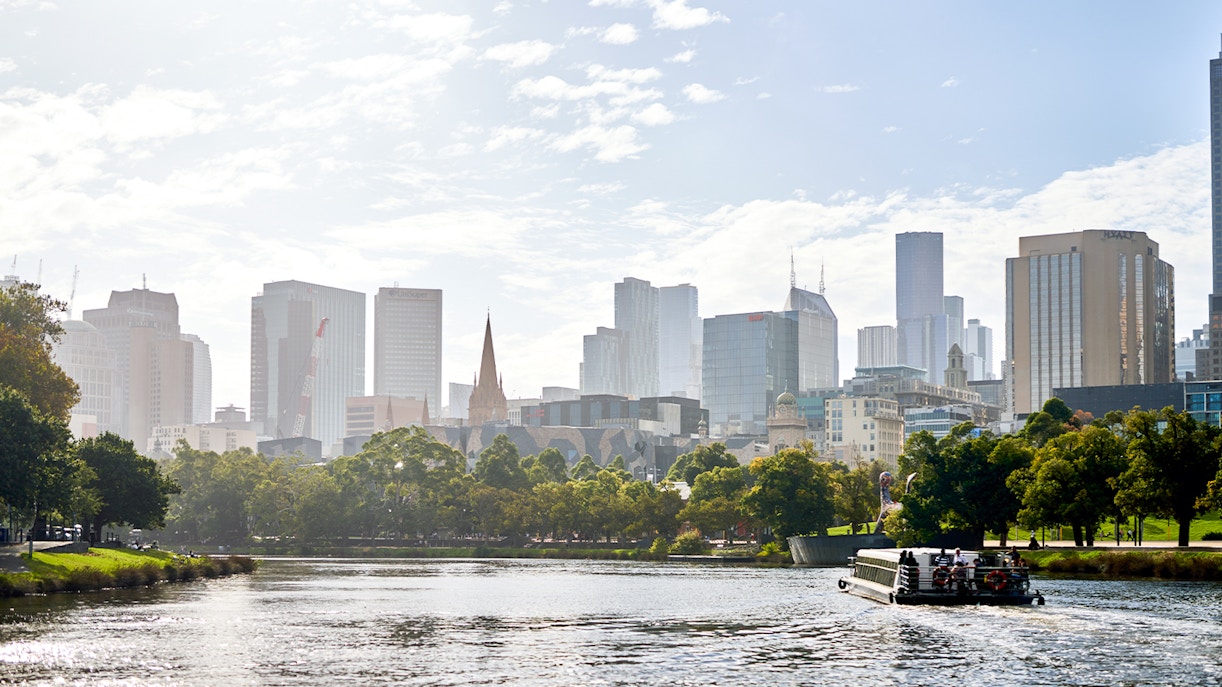 River cruise on Yarra River with Melbourne skyline in the background.