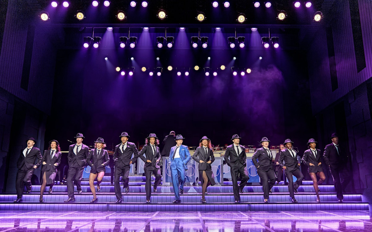 Joel Harper-Jackson as Frank Sinatra with the ensemble company of Sinatra The Musical at the Aldwych Theatre