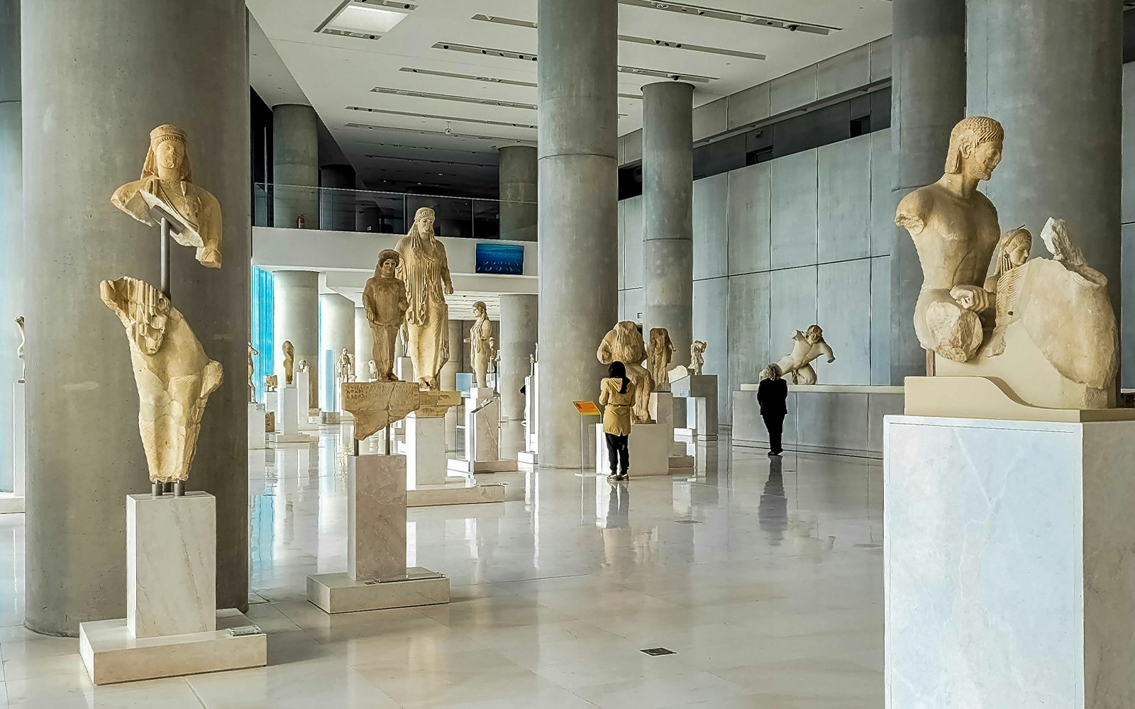 Ancient sculptures displayed in the Acropolis Museum, Athens.