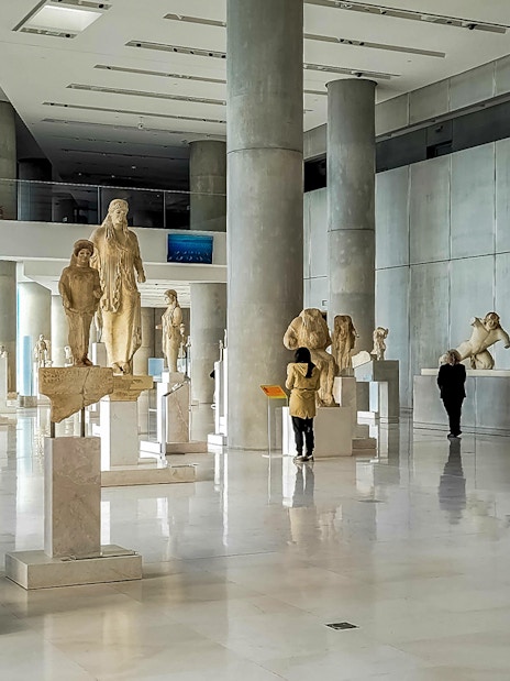 Ancient sculptures displayed in the Acropolis Museum, Athens.
