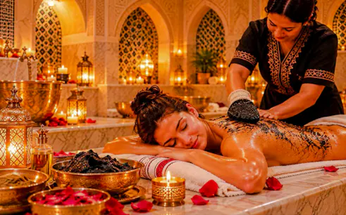 Traditional Moroccan hammam with argan oil massage in Marrakesh spa setting.