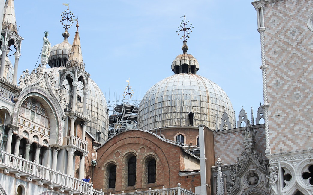 Dome and facade details of St Mark's Basilica in Venice, Italy.