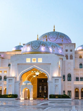 Qasr Al Watan palace entrance in Abu Dhabi, showcasing intricate domes and architecture.