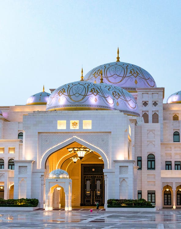 Qasr Al Watan palace entrance in Abu Dhabi, showcasing intricate domes and architecture.