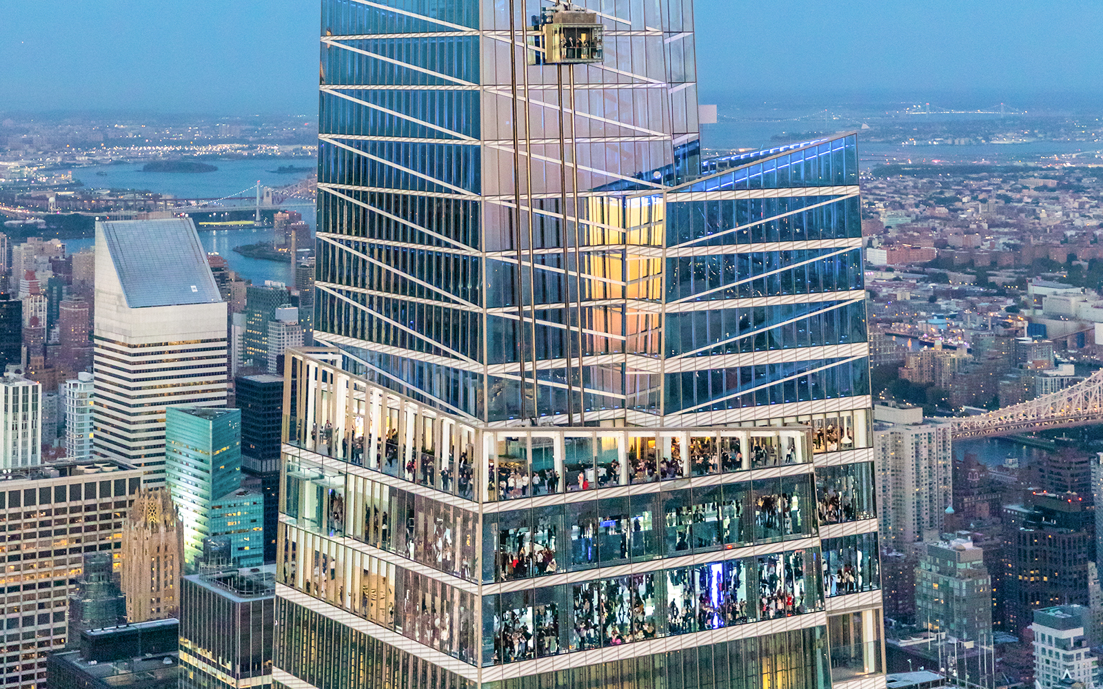 Aerial view of SUMMIT One Vanderbilt in New York City with surrounding skyscrapers.