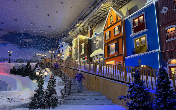 Genting Highlands Snow World Theme Park with colorful buildings and artificial snow.