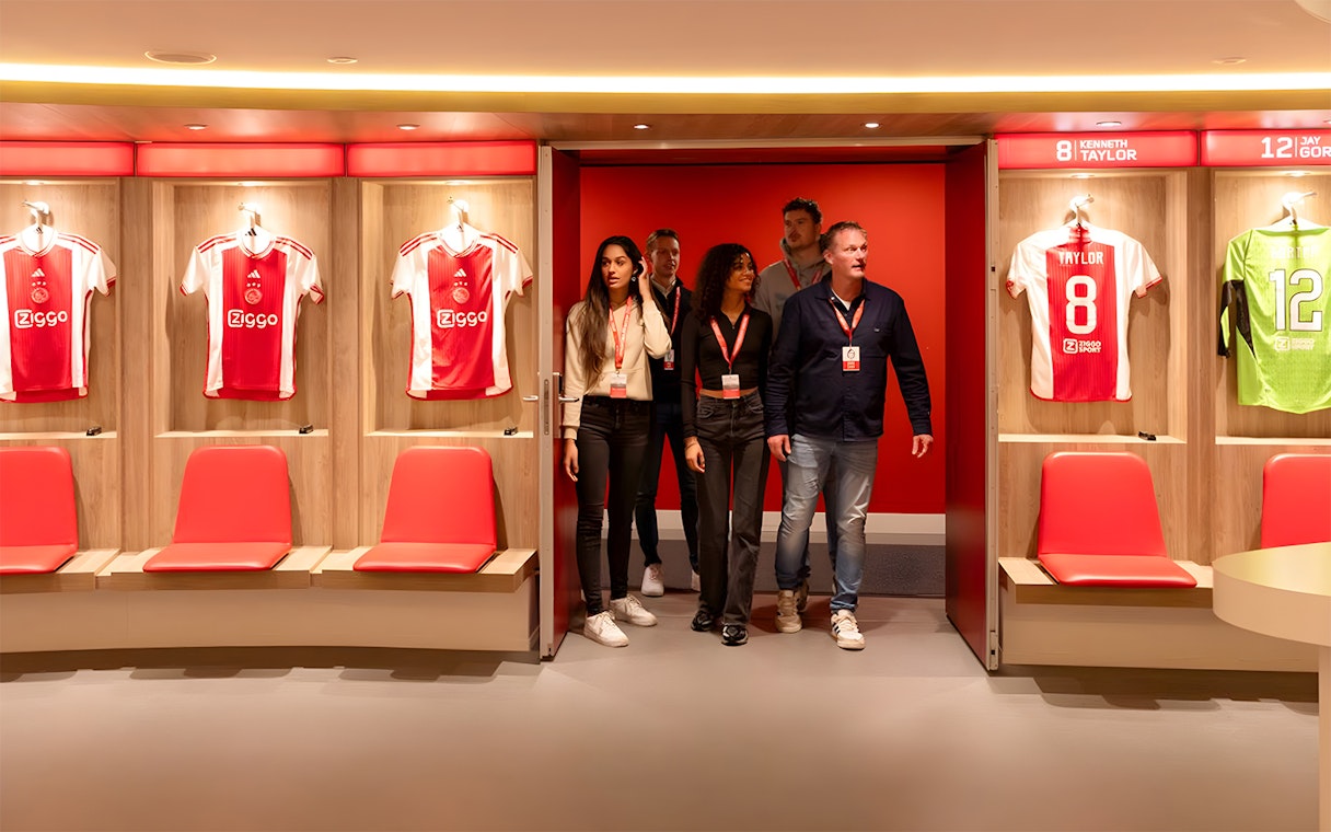 Visitors touring the Johan Cruijff ArenA locker room in Amsterdam.