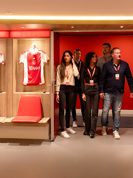 Visitors touring the Johan Cruijff ArenA locker room in Amsterdam.