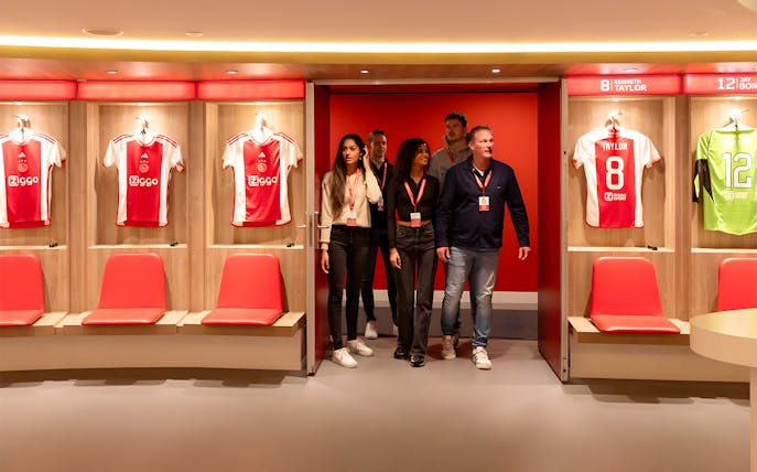 Visitors touring the Johan Cruijff ArenA locker room in Amsterdam.