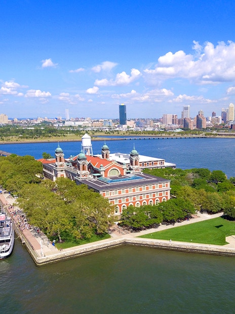 Ellis Island with New York City skyline in the background.