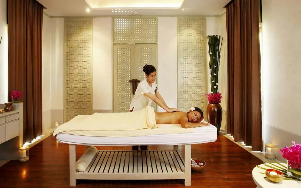 Massage therapy session at Melati Beach Resort & Spa, Ko Samui.