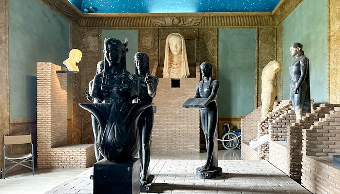 Ancient sculptures in a corridor of the Vatican Museums, part of the Patrizi Palace tour in Rome.