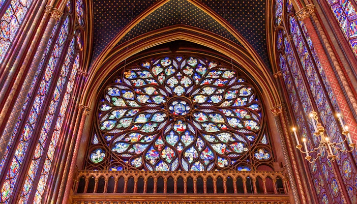 Sainte Chapelle Paris rose window with intricate stained glass design.