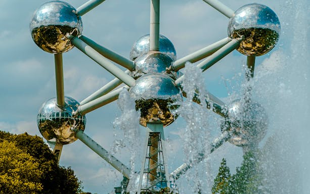 Atomium structure with fountains in Brussels, Belgium.