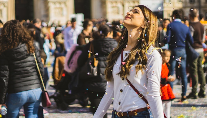Milan February Carnival parade with colorful costumes and masks in Italy.