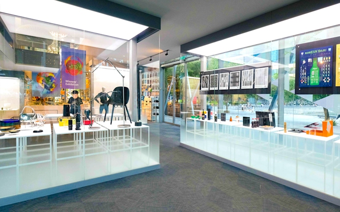 Red Dot Design Museum interior with design exhibits and shopping area in Singapore.